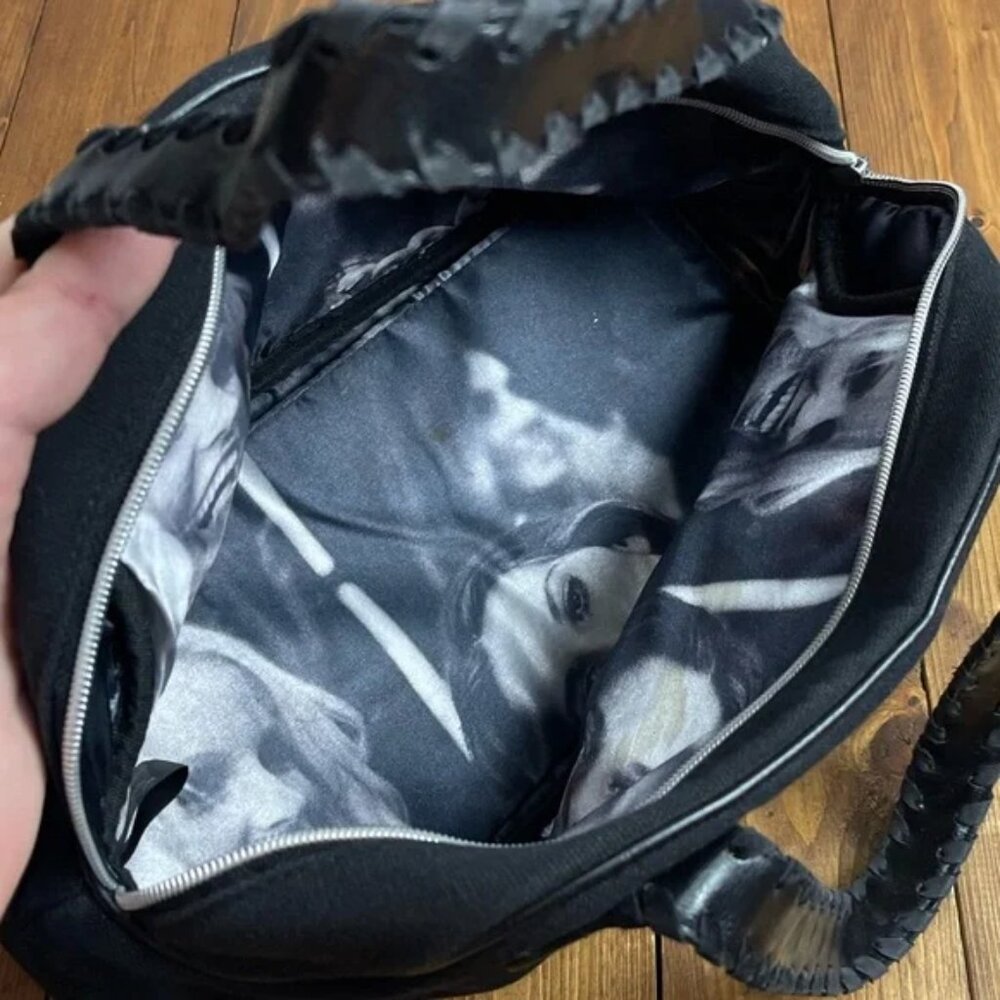 Victoria’s Secret Black and silver canvas hand bag with lips kiss design. - Picture 2 of 4